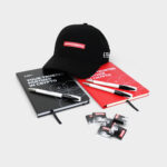 Blociņi, pildspalvas, cepure, šokolādītes ar logo druku